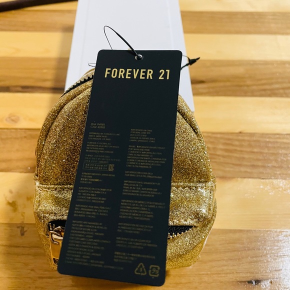 2/$20 gold Glitter mini backpack forever21 - Picture 4 of 7